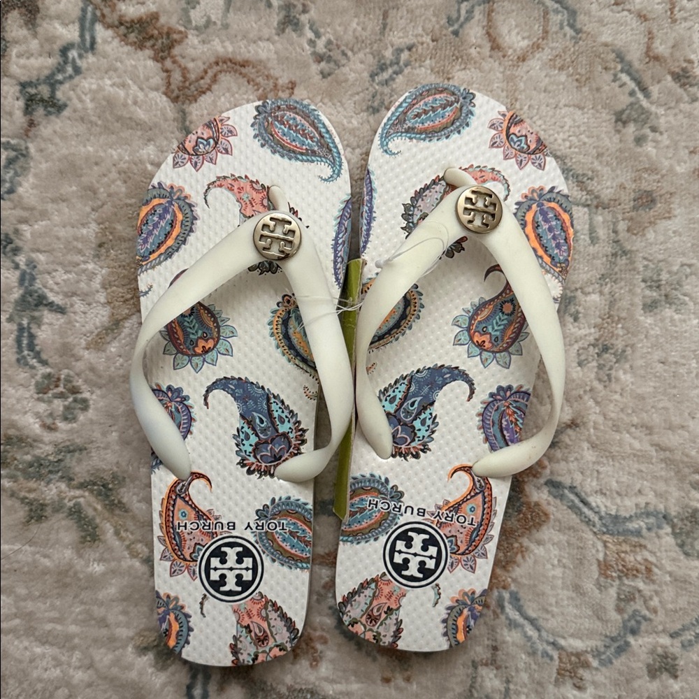 Tory Burch White Paisley Flip Flops
New